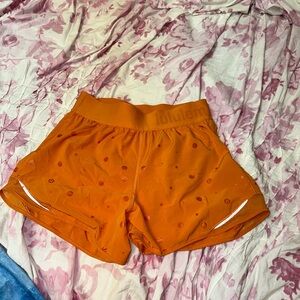 LULULEMON orange logo shorts size 6